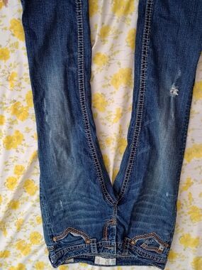 MEK Women's Blue Boot Cut Jeans with Subtle Distressing